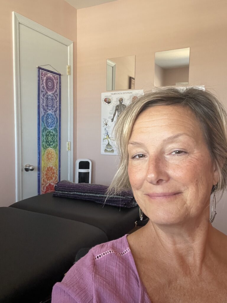 Gina Headshot in office