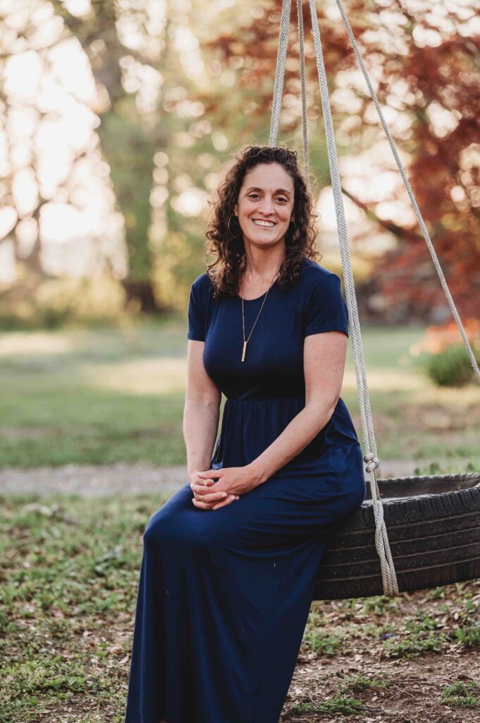 lunden-sitting-on-tire-swing-close-up-1